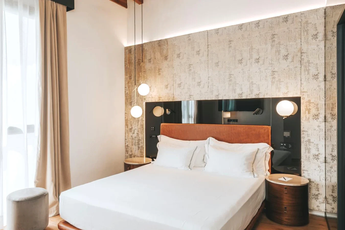 Cama de la habitación en Vincci Selección Unuk 5 GL Sevilla